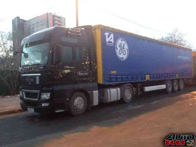 MAN TGX 18.440 4x2 BLS и полуприцеп krone тент 