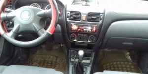 Nissan Almera, 2004