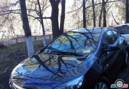 Опель Астра GTC, 2012 года